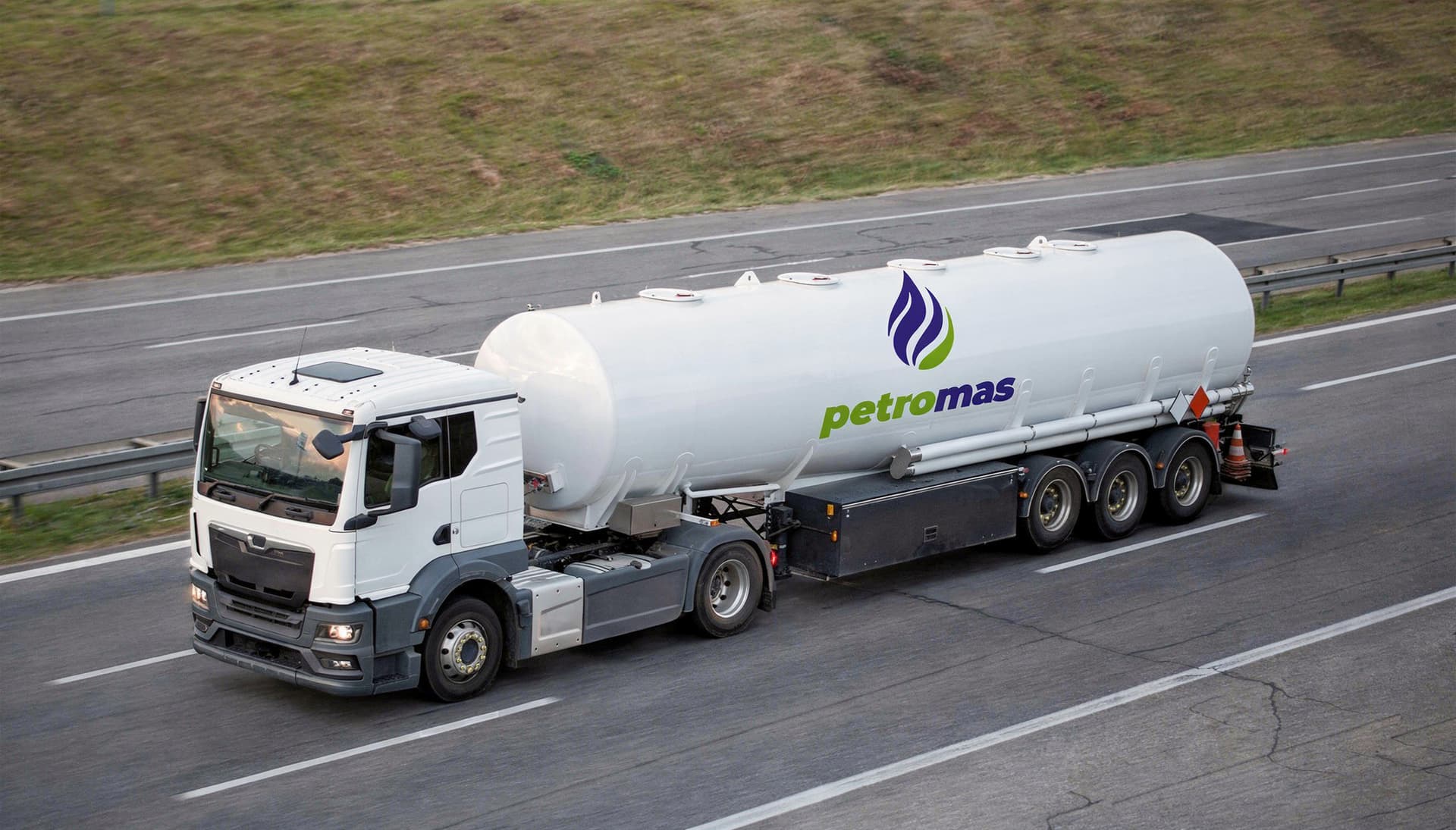 Petromas branded road tanker on highway